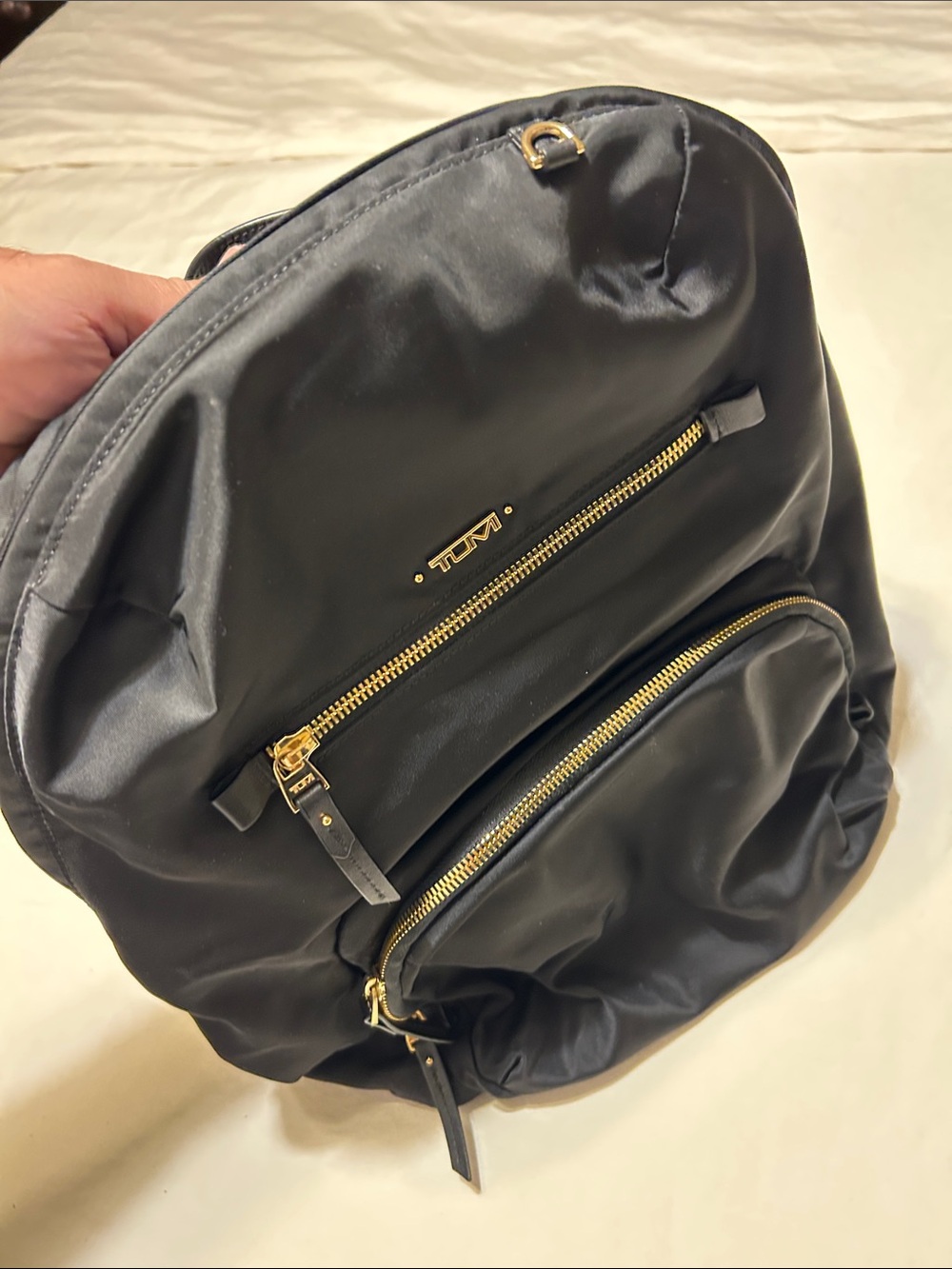 Tumi Black Nylon Backpack with Gold Hardware Accents